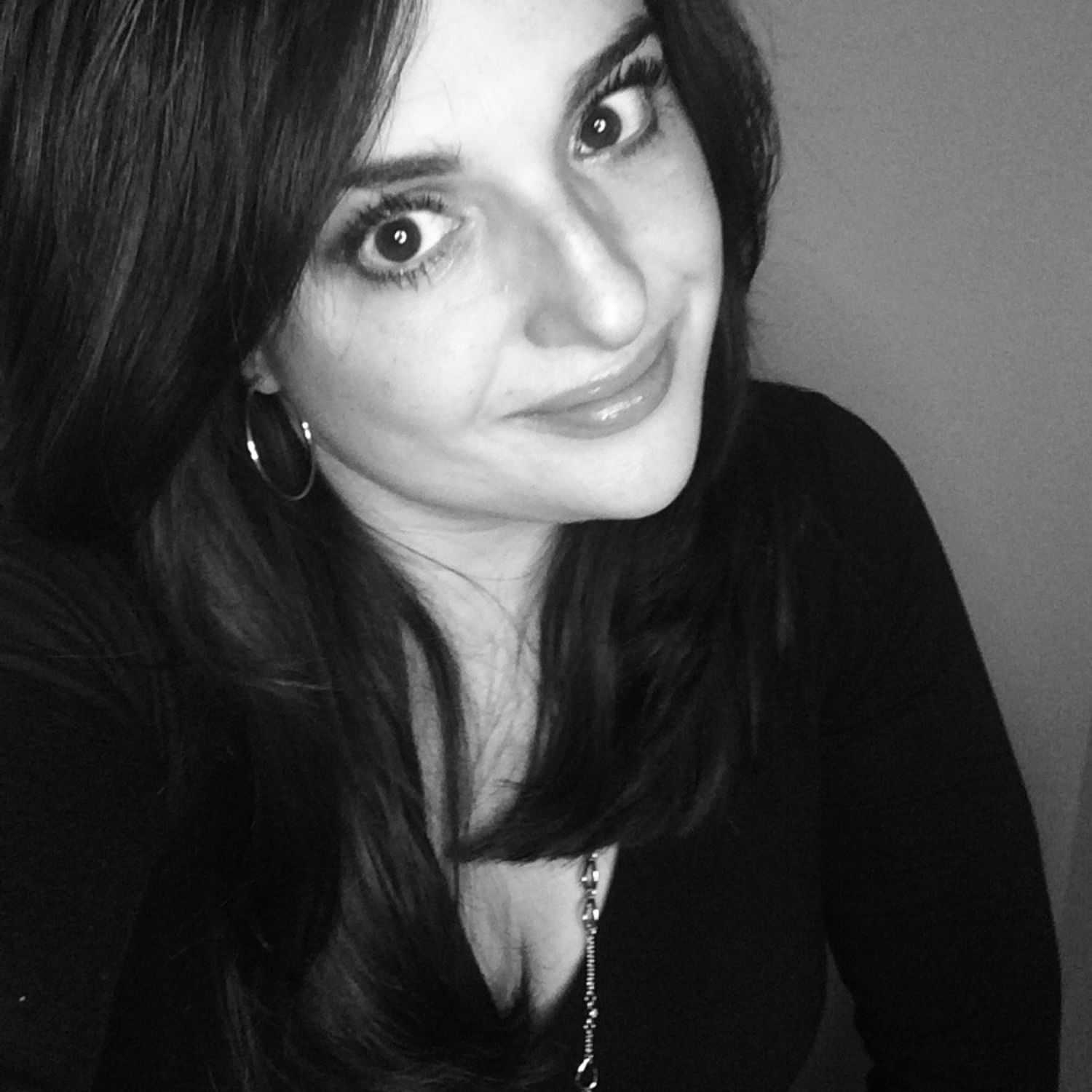 Portrait of Bianca Perrone, a professional stylist at Modern Salon by Melissa Schiavone, showcasing their expertise and style.