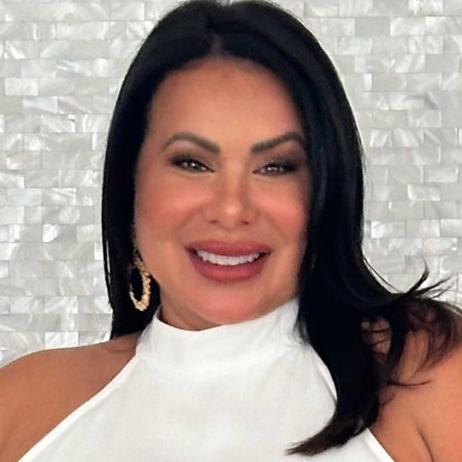 Portrait of Melissa Schiavone, a professional stylist at Modern Salon by Melissa Schiavone, showcasing their expertise and style.